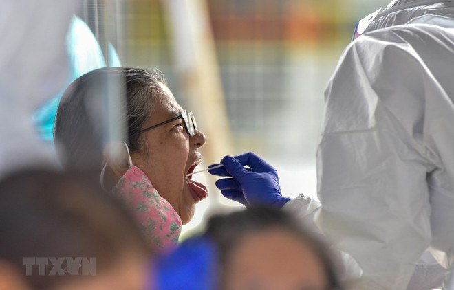 Indonesia antepone la salud a la economía, según ministro ảnh 1