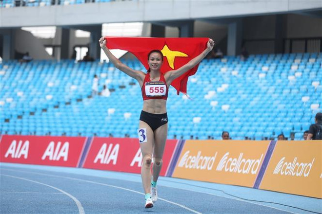 Atletas vietnamitas continúan brillando en SEA Games 32 ảnh 2