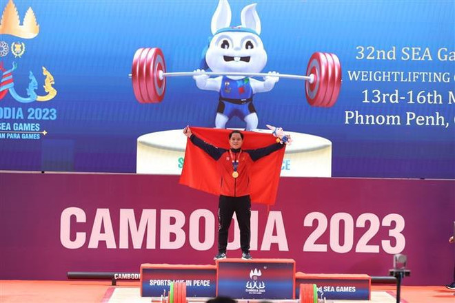 Pesista vietnamita establece tres plusmarcas en SEA Games 32 ảnh 1 Pesista vietnamita establece tres plusmarcas en SEA Games 32 ảnh 1