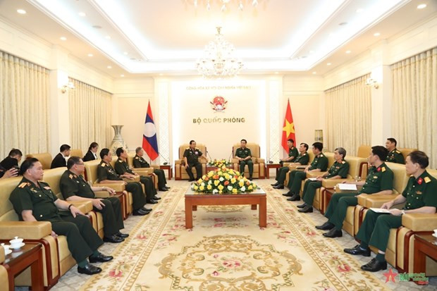 Ministro de Defensa recibe a delegación de Federación de Veteranos de Laos ảnh 1