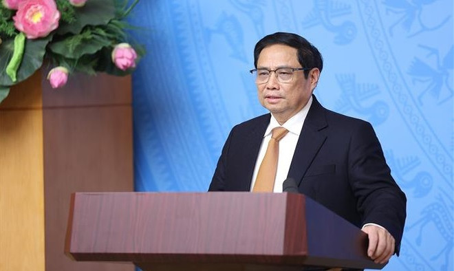 Primer ministro de Vietnam preside reunión sobre la respuesta contra COVID-19 ảnh 1
