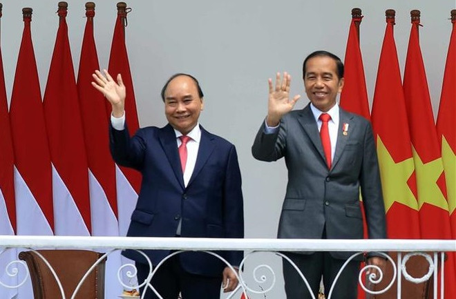 Ceremonia oficial de bienvenida al presidente vietnamita en Indonesia ảnh 1 Ceremonia oficial de bienvenida al presidente vietnamita en Indonesia ảnh 1