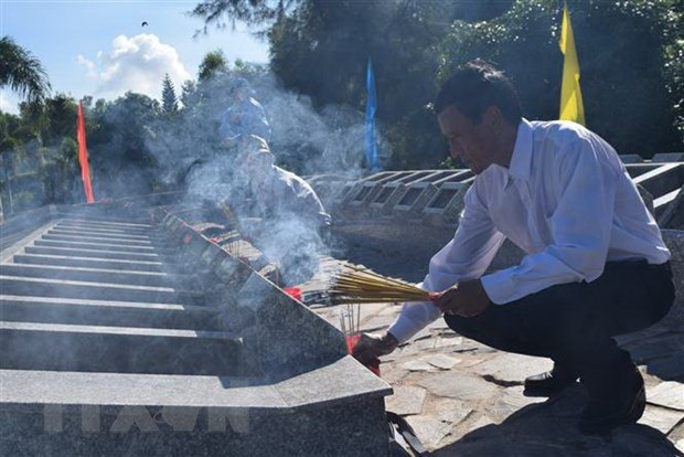 Entierran restos de combatientes vietnamitas ảnh 1