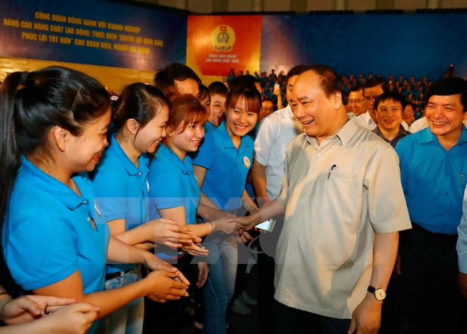 Premier vietnamita pide mayor atención a los trabajadores ảnh 1 Premier vietnamita pide mayor atención a los trabajadores ảnh 1