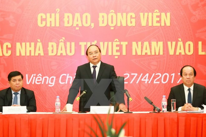 Primer ministro de Vietnam prosigue actividades en Laos ảnh 1 Primer ministro de Vietnam prosigue actividades en Laos ảnh 1