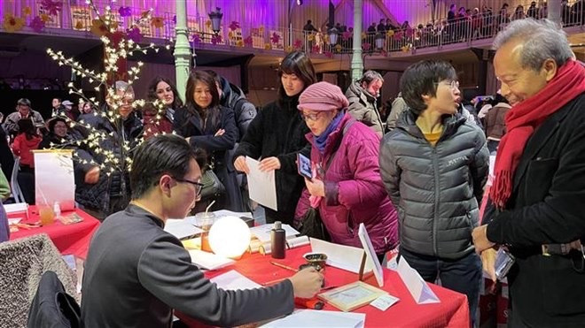 Vietnamitas en Francia y Alemania celebran el Tet (Año Nuevo Lunar) 2023 ảnh 1 Vietnamitas en Francia y Alemania celebran el Tet (Año Nuevo Lunar) 2023 ảnh 1