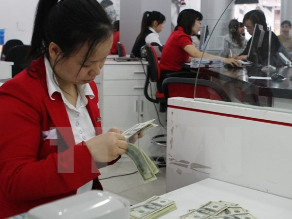 Vietnam reajusta tipo de cambio frente a devaluación de yuan ảnh 1 Vietnam reajusta tipo de cambio frente a devaluación de yuan ảnh 1