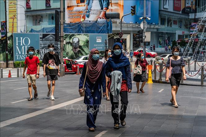 Malasia refuerza control de pandemia del COVID-19 para recuperar economía ảnh 1 Malasia refuerza control de pandemia del COVID-19 para recuperar economía ảnh 1