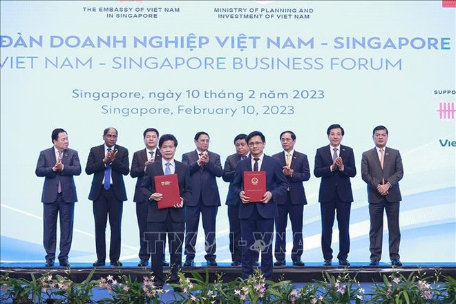 Gira del primer ministr por Singapur y Brunei alcanza resultados sustantivos ảnh 2 Gira del primer ministr por Singapur y Brunei alcanza resultados sustantivos ảnh 2
