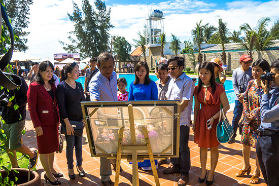 Exposición fotográfica destaca belleza de mujeres vietnamitas ảnh 1 Exposición fotográfica destaca belleza de mujeres vietnamitas ảnh 1