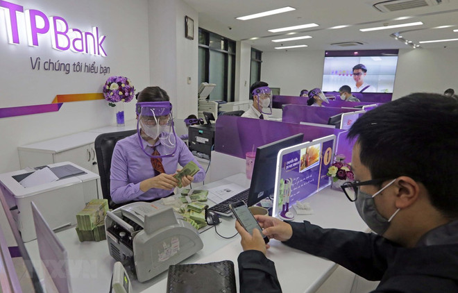 Bancos vietnamitas asisten a los afectados por el COVID-19 ảnh 1 Bancos vietnamitas asisten a los afectados por el COVID-19 ảnh 1