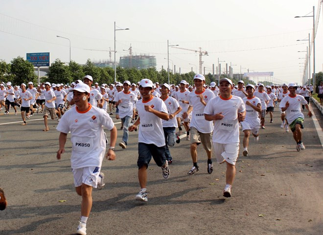 Día de Carrera Olímpica en Vietnam refuerza conciencia pública sobre ejercicio físico ảnh 1