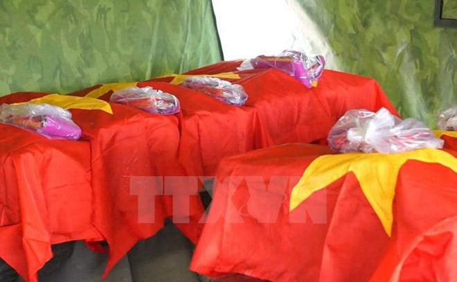 Rinden homenaje póstumo a combatientes voluntarios vietnamitas caídos en Laos ảnh 1 Rinden homenaje póstumo a combatientes voluntarios vietnamitas caídos en Laos ảnh 1