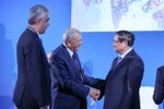 El primer ministro de Vietnam, Pham Minh Chinh, saluda al presidente de Irak, Abdul Latif Jamal Rashid (Foto: VNA)