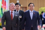 El primer ministro de Vietnam, Pham Minh Chinh (derecha), y el Rey de Jordania, Abdullah II Ibn Al-Hussein (Foto: VNA)