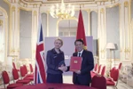 El ministro vietnamita de Seguridad Pública, general Luong Tam Quang, y la ministra del Interior del Reino Unido, Yvette Cooper (Foto: VNA)