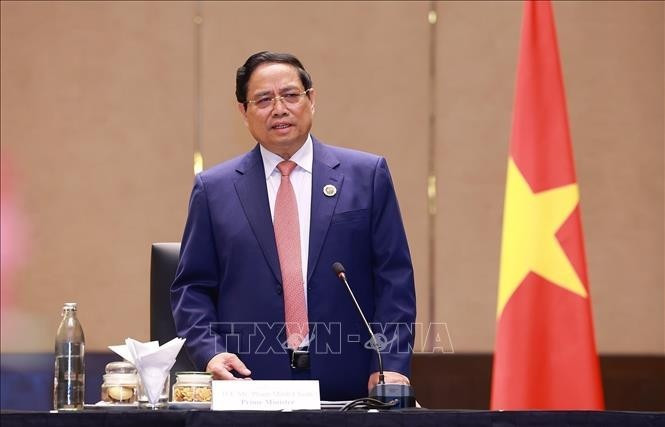 El primer ministro vietnamita, Pham Minh Chinh, habla en el evento. (Fuente: VNA)