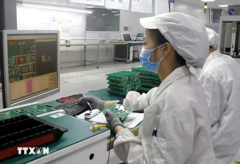 Trabajadores de la industria de semiconductores. (Fuente: VNA)