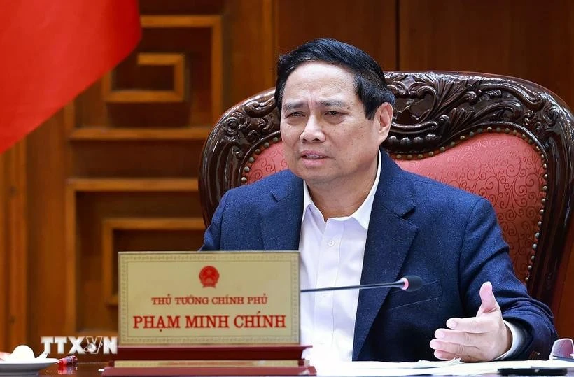 El primer ministro Pham Minh Chinh habla en la reunión. (Fuente: VNA)