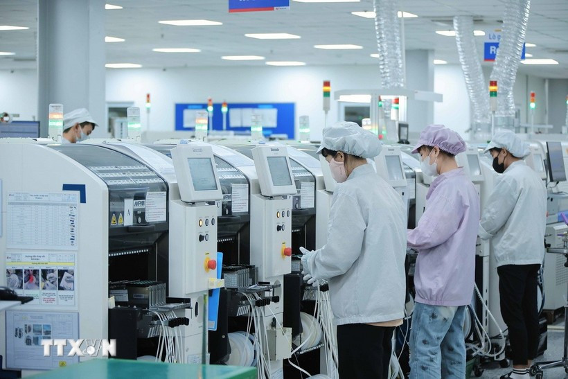 Empresas con inversión extranjera directa (IED) han invertido en muchos de los sistemas de maquinaria más modernos y avanzados. (Foto: VNA)
