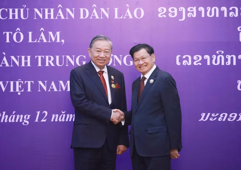 El secretario general del Partido Comunista de Vietnam (PCV), To Lam, y el secretario general del Partido Popular Revolucionario (PPRL) y presidente de Laos, Thongloun Sisoulith. (Fuente: VNA)