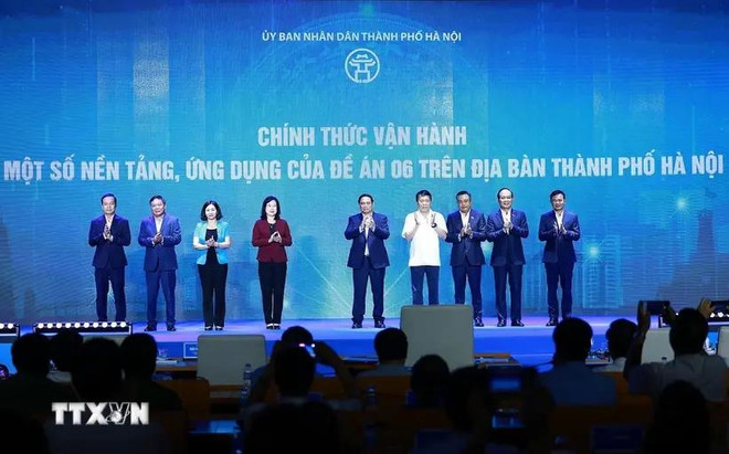 El primer ministro de Vietnam, Pham Minh Chinh (en el medio) en la Conferencia. (Fuente: VNA) 20240628-thu-tuong-de-an-06-tp-ha-noi-9-1545.jpg.webp