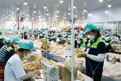 Trabajadores del Parque Industrial Du Long, provincia de Khanh Hoa. (Foto: VNA)