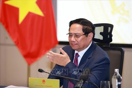 El primer ministro de Vietnam, Pham Minh Chinh, preside la cita (Foto: VNA)