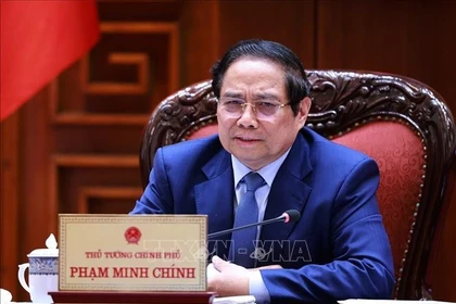 El primer ministro de Vietnam, Pham Minh Chinh, interviene en la reunión (Foto: VNA)