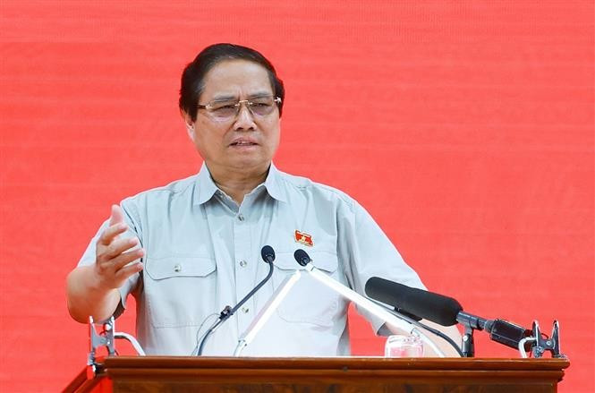 El primer ministro Pham Minh Chinh interviene en la conferencia. (Fuente; VNA)