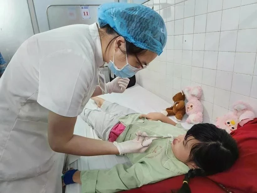 En Vietnam, aproximadamente uno de cada 700 a 800 niños nace con esta afección. (Foto: VNA)