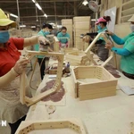 La madera y los productos de madera se encuentran entre los 7 grupos de productos agrícolas, forestales y acuáticos con un valor de exportación superior a mil millones de USD. (Foto: VNA)