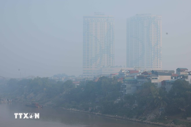 Contaminación en las grandes ciudades. (Fuente: VNA) chat-luong-khong-khi-3.jpg
