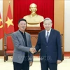 El secretario general del Partido Comunista de Vietnam, To Lam (derecha), recibe a Wang Laixing, vicepresidente del grupo chino Luxshare-ICT. (Foto: VNA)