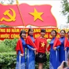 Habitantes de Hanoi posan para una foto con motivo del 80.º aniversario de la Revolución de Agosto y el Día Nacional. (Foto: VNA)