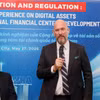 Richard McClellan, director ejecutivo del VIFC en Ciudad Ho Chi Minh, intervienen en la cita (Foto: VNA)