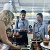 Degustación de platos preparados en el programa "Explorar la Agricultura de Estados Unidos", organizado por el Departamento de Agricultura de Estados Unidos y el Consulado General de Washington en Ciudad Ho Chi Minh. (Foto ilustrativa: VNA)