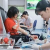 Voluntarios donan sangre (Foto: VNA)