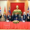 El secretario general del Partido Comunista y presidente de Vietnam, To Lam, y los delegados presencian la ceremonia de firma del Tratado de Libre Comercio entre Vietnam y la Asociación Europea de Libre Comercio (VEFTA). (Foto: VNA)