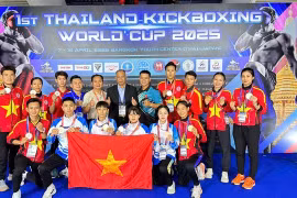 Atletas y entrenadores vietnamitas en el torneo (Foto: VNA)