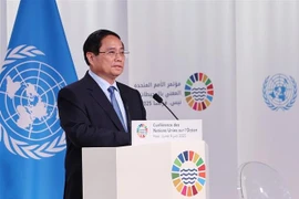 El primer ministro de Vietnam, Pham Minh Chinh, interviene en la cita (Foto: VNA)