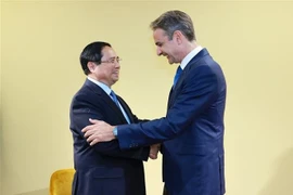 El primer ministro de Vietnam, Pham Minh Chinh (izquierda), y su homólogo griego, Kyriakos Mitsotakis (Foto: VNA)