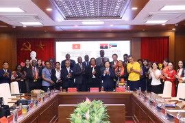 Delegados participantes en la ceremonia de clausura (Foto: VNA)