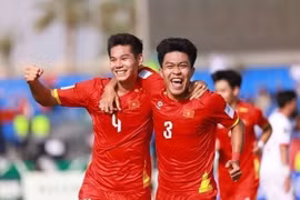 El defensor central Hieu Minh (número 4) anotó el 2-0 para Vietnam Sub-23. (Foto: AFC)