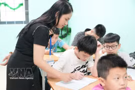 Una clase dedicada a niños con discapacidades auditivas y del habla en la provincia de Bac Ninh. (Foto: VNA)