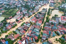 Más de 5.000 hogares en el barrio de Yen Bai, provincia de Lao Cai, se vieron afectados por las inundaciones. (Foto: VNA)