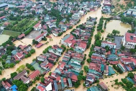 Más de 5.000 hogares en el barrio de Yen Bai, provincia de Lao Cai, se vieron afectados por las inundaciones. (Foto: VNA)