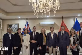 Delegados participantes en el encuentro (Foto: VNA)