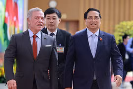El primer ministro de Vietnam, Pham Minh Chinh (derecha), y el Rey de Jordania, Abdullah II Ibn Al-Hussein (Foto: VNA)