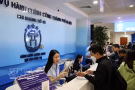 En el Centro de Servicios Administrativos Públicos de Hanoi (Foto: VNA)
